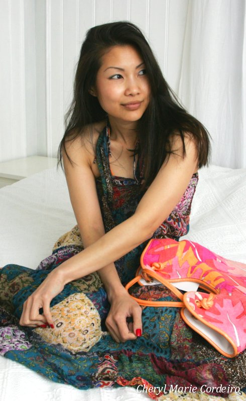 Cheryl Marie Cordeiro-Nilsson, Indiska patch-work dress, Emilio Pucci bag.