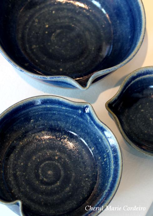 Blue pots in heart form by Helen Kainert.