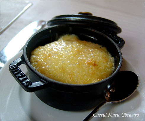 In a small cast iron pot, gratinated potato puree with Gruyére cheese