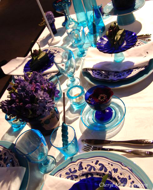 Table setting of blues and purples.