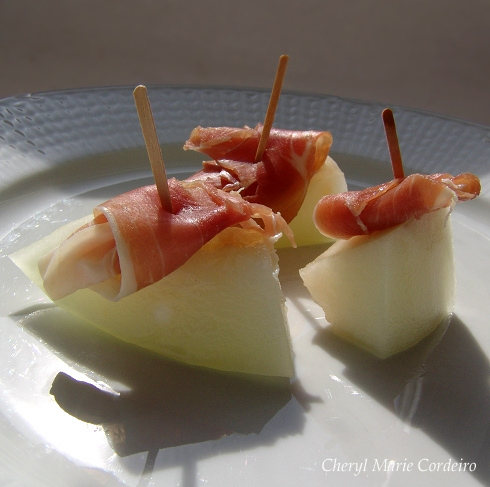 Melon topped with sun dried prosciutto, Cheryl Marie Cordeiro