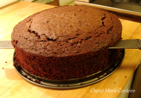 Slicing chocolate cake into three