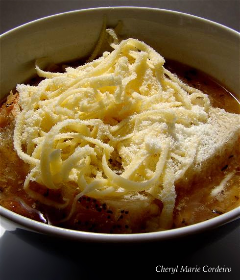 Cheese on top of the French Onion Soup
