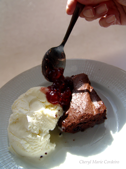 Chocolate brownie, ice-cream, raspberry jam