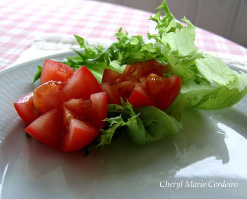 Star-cut tomatoes on a bed of lettuce