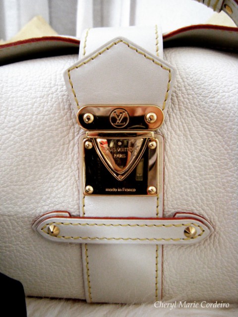 Louis Vuitton suhali goat grained leather, L'Impetueux in white, golden brass lock.