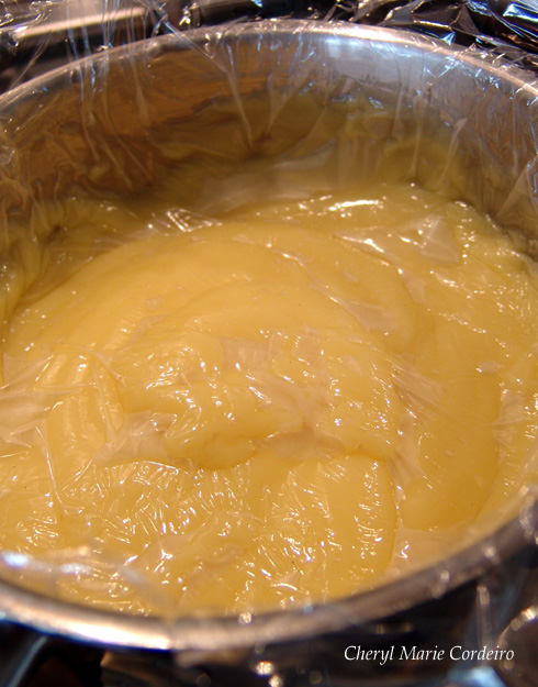 Thick egg custard for custard egg tarts, covered in cling film. 