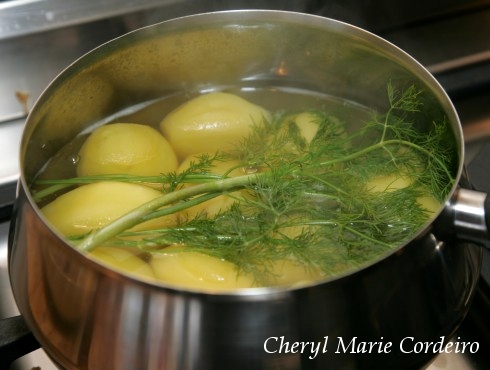 In the pot, boiled potatoes and dill for a Swedish Midsummer meal.