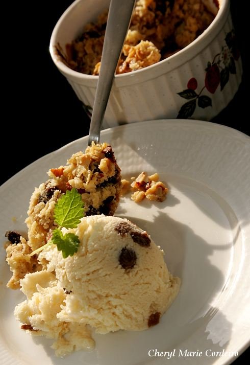 Applecrumble and rum-raisin ice-cream.