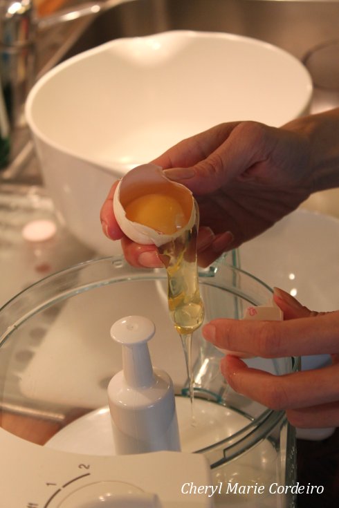 Separating egg yolks from egg whites.