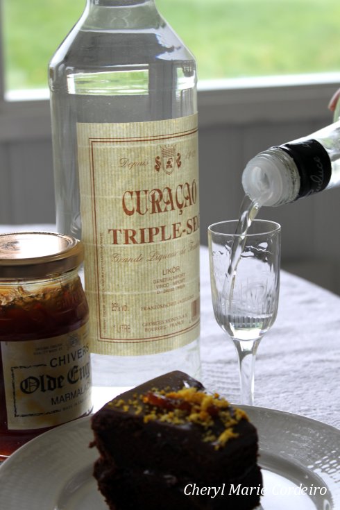 Serve with grated orange zest, orange peel marmalade and a shot of Curaco Triple Sec.