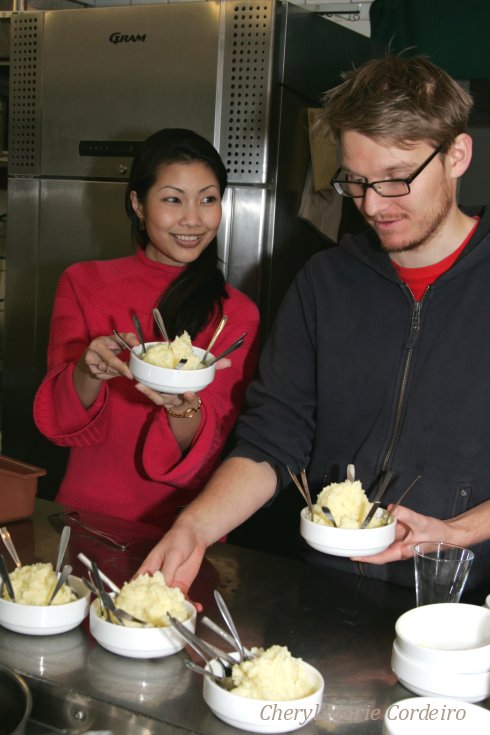 Cheryl M Cordeiro Nilsson, helping serve mashed potatoes for a taste round.