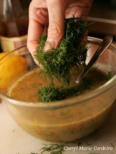 Adding dill to the mustard sauce, gravlax.